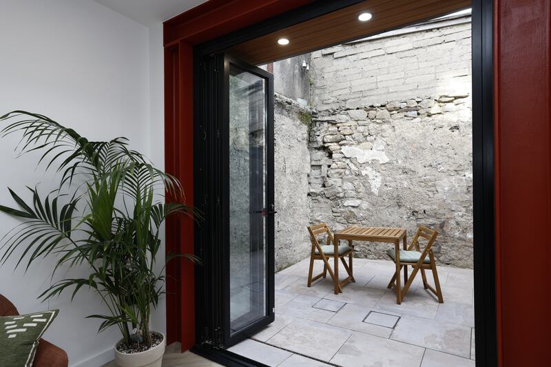 Back patio to the rear of the property. Photograph: Nick Bradshaw/The Irish Times
