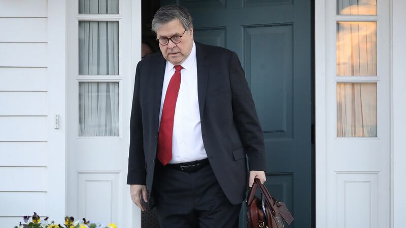 US attorney general William Barr, pictured leaving his home on Tuesday, submitted a four-page summary of Robert Mueller’s investigation to Congress.  Photograph: Win McNamee/Getty Images