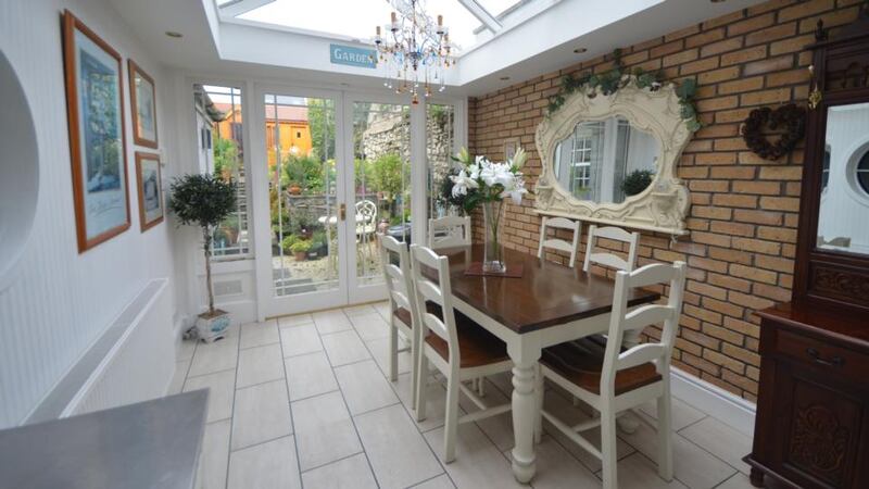 The kitchen at 22 Howth Road  opens out to a small conservatory.