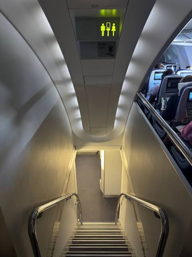 Many passengers are drawn to the downstairs toilets, often taking pictures of the staircase and waiting area.