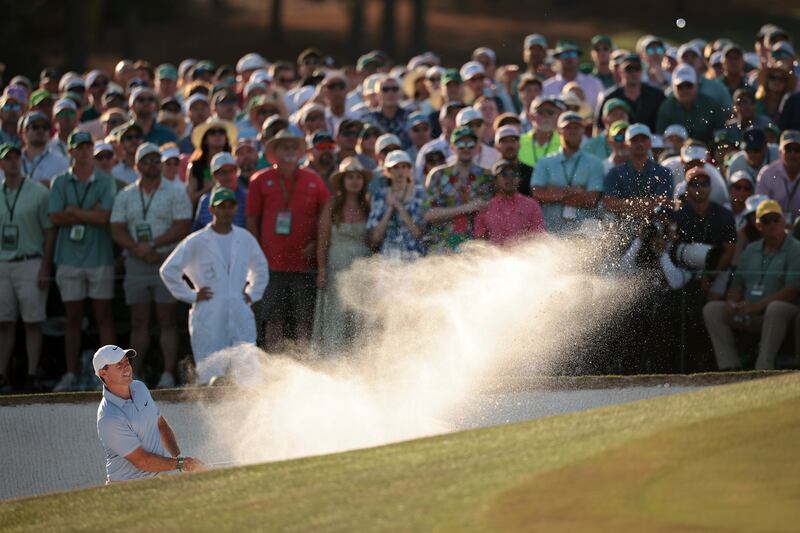 Rory McIlroy of Northern Ireland plays a shot from a bunker on the 18th hole during the final round of the 2026 Masters Tournament at Augusta National Golf Club on April 12, 2026 in Augusta, Georgia. Photograph: Jared C. Tilton/Getty Images