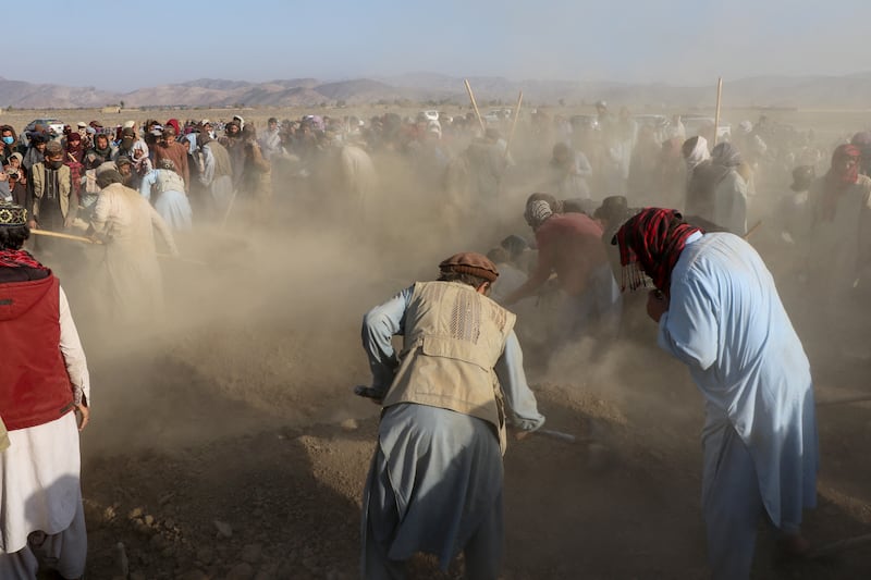 Afghan mourners and relatives of victims during a mass burial ceremony for nine children and one woman killed by a Pakistan air strike, in the Gurbuz district of Khost Province on November 25th 2025. Photograph: AFP via Getty Images