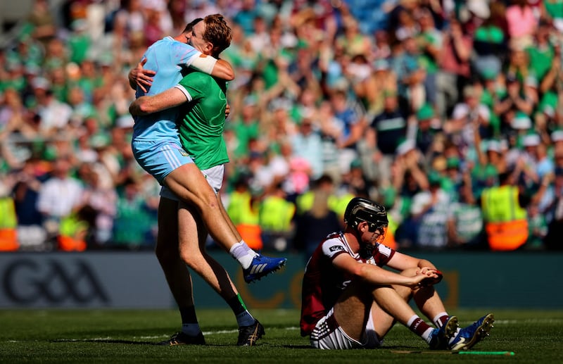 Limerick's Nickie Quaid and William O'Donoghue celebrate after the match. Photograph: Ryan Byrne/Inpho