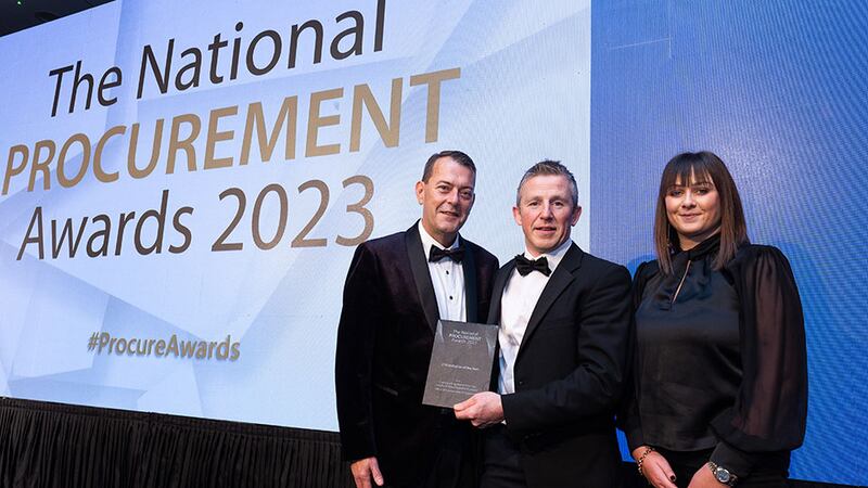 Paul Farrelly, awards judge, presents the CSR initiative of the year award to Eimear Cronin and Fergus Harman, Office of Government Procurement team