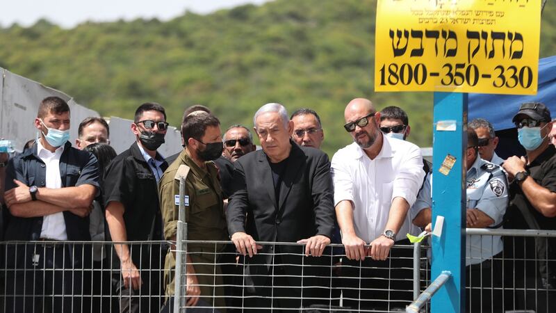 Israeli Prime Minister Benjamin Netanyahu visits Mount Meron, northern Israel, where dozens of people were killed and injured. Photograph: Ronen Zvulun/EPA