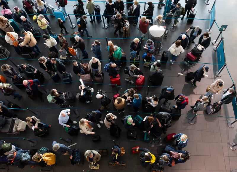 People queuing at Aer Lingus check-in desks at Dublin Airport. Photograph: Sam Boal/Collins