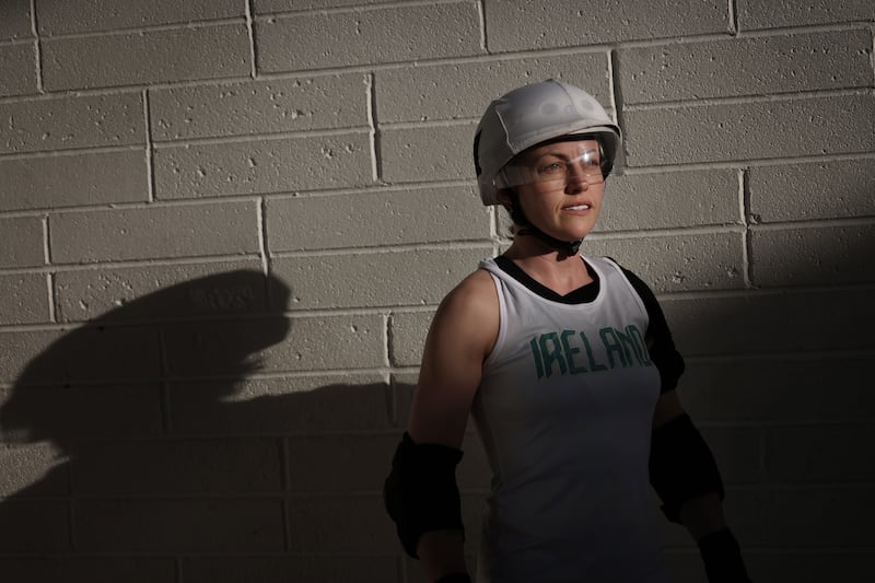  Elaine Snowden (Dashing Trudy Snow) among members of the Team Ireland Roller Derby squad in training. Photo: Bryan O’Brien / The Irish Times 