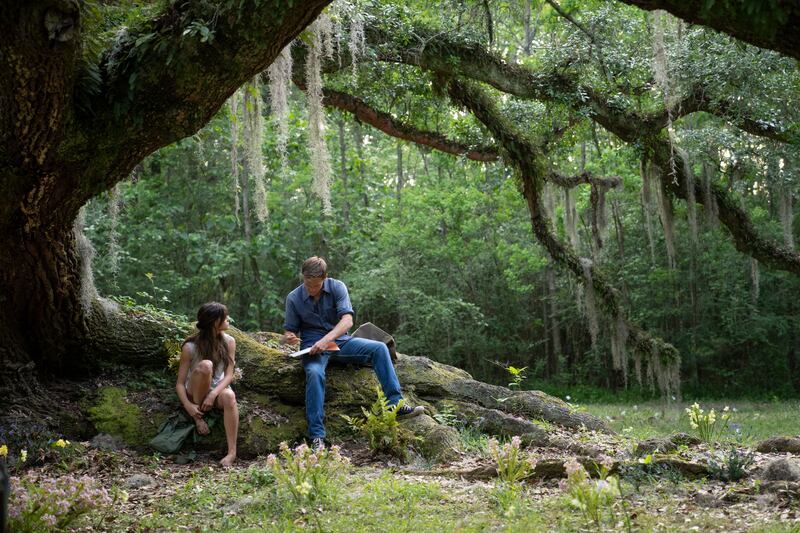 Daisy Edgar-Jones as Kya and Taylor John Smith as Tate Walker in Where the Crawdads Sing