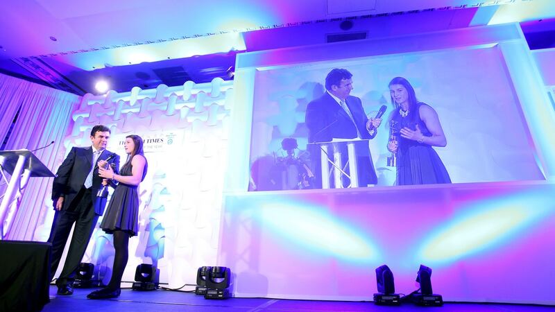 Katie Taylor is interviewed on stage after winning the Sportswoman of the Year by Des Cahill. Photograph: Cathal Noonan/Inpho