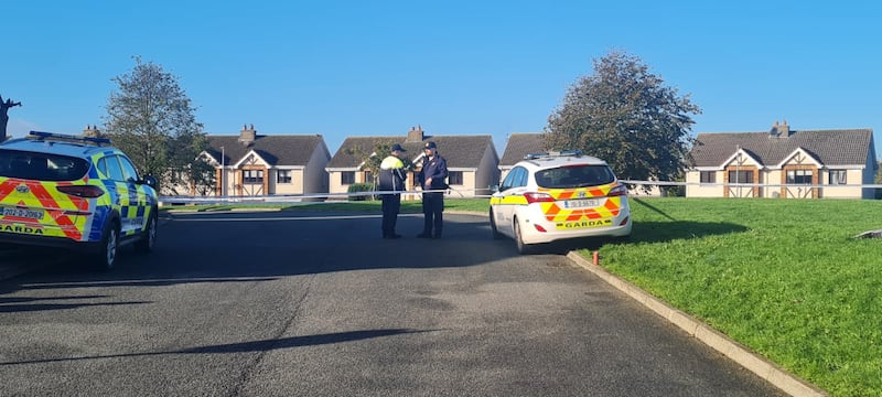 A Garda cordon is in place in the estate in the south of Waterford city. Photograph: Barry Roche