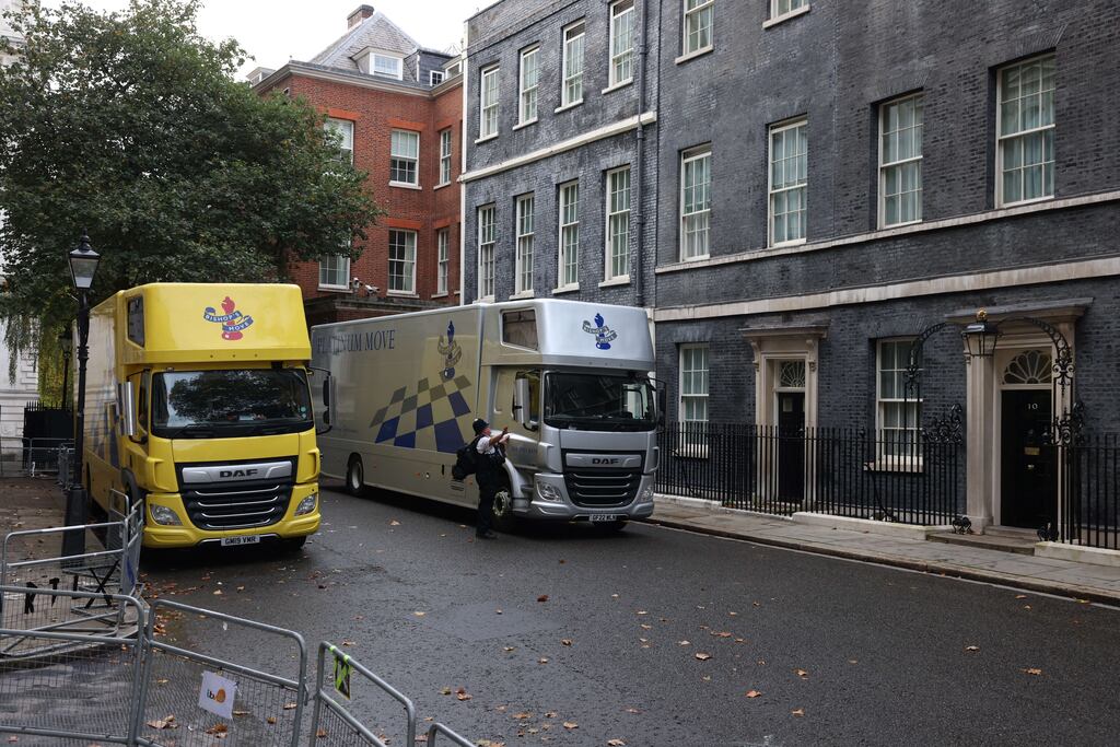 Removal vans sit parked outside number 10 Downing Street last week after another change of prime minister. (Photo by Hollie Adams/Getty Images)