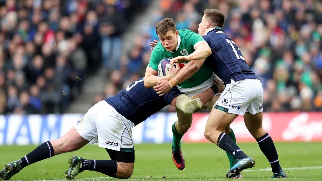 Ireland’s Garry Ringrose is tackled by Scotland’s Zander Fagerson and Huw Jones during the Six Nations game at Murrayfield. Photograph: Billy Stickland/Inpho