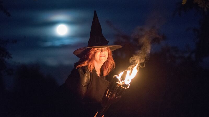 Bláthnaid Ní Chofaigh, Spirits of Meath Ambassador for 2017, lights the first torch fire of Samhain in Athboy signalling the start of Halloween and the Spirits of Meath Halloween Festival 2017.