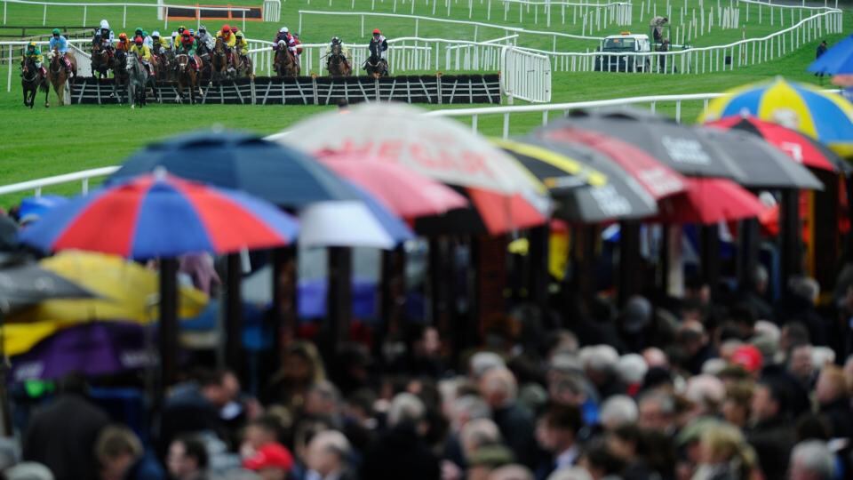 Runners clear the first flight of hurdles in The Colm Murray Memorial Handicap Hurdle. Photograph: Alan Crowhurst/Getty Images