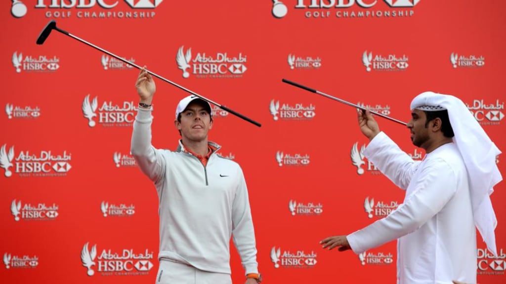 Rory McIlroy appears on stage during a photo call prior to the start of the Abu Dhabi HSBC Golf Championship. (Photo by Ross Kinnaird/Getty Images)