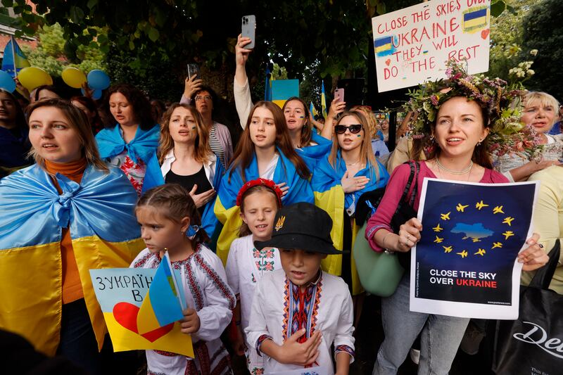 Crowd gathered at the Ukrainian Embassy to mark the six month anniversary of the Russian invasion outside the Ukrainian Embassy in Dublin, which was organised by the Ukrainian Action Ireland group.
Photograph: Alan Betson / The Irish Times

