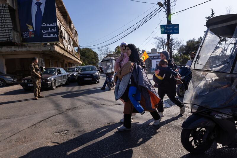 Residents of Beirut's southern suburbs flee from the area after the Israeli military threatened all of Dahiyeh with an evacuation order on March 5th in Beirut, Lebanon.  Photograph: Daniel Carde/Getty