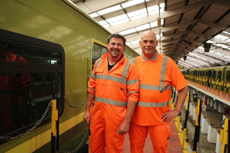 Long-time friends and Dart workers Brian Fitzgerald, left, and Gareth Walley in the Fairview depot. Photograph: Bryan O’Brien