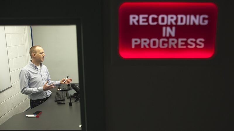A lecturer in IT Sligo delivering a remote class, which can be streamed live or played back.