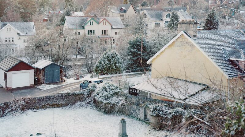 Homes in Kingussie, Scotland. As Anders Holch Povlsen, a fast-fashion billionaire, buys up land for an environmental experiment to revive Scotland’s peatlands, the influx of money has increased housing prices around Glenfeshie, putting homes in the area out of reach for some local people. Photograph: Catherine Hyland/The New York Times