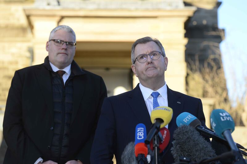 Jeffery Donaldson with Gavin Robinson (left) address the media outside Stormont in January.  Photograph: Mark Marlow/EPA