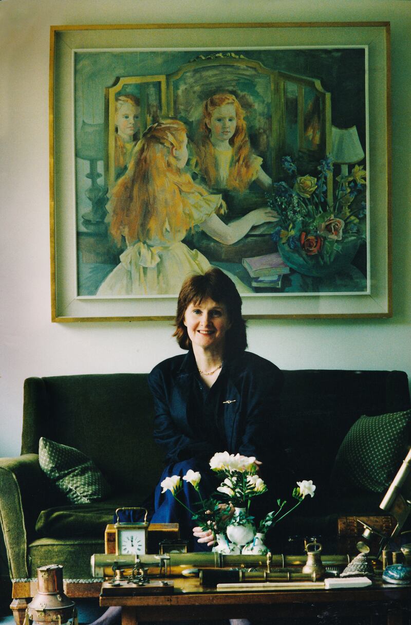 Poet Eavan Boland at her home in April 1992, with the portrait by her mother, Frances Kelly. Photograph: Joe St Leger /  The Irish Times