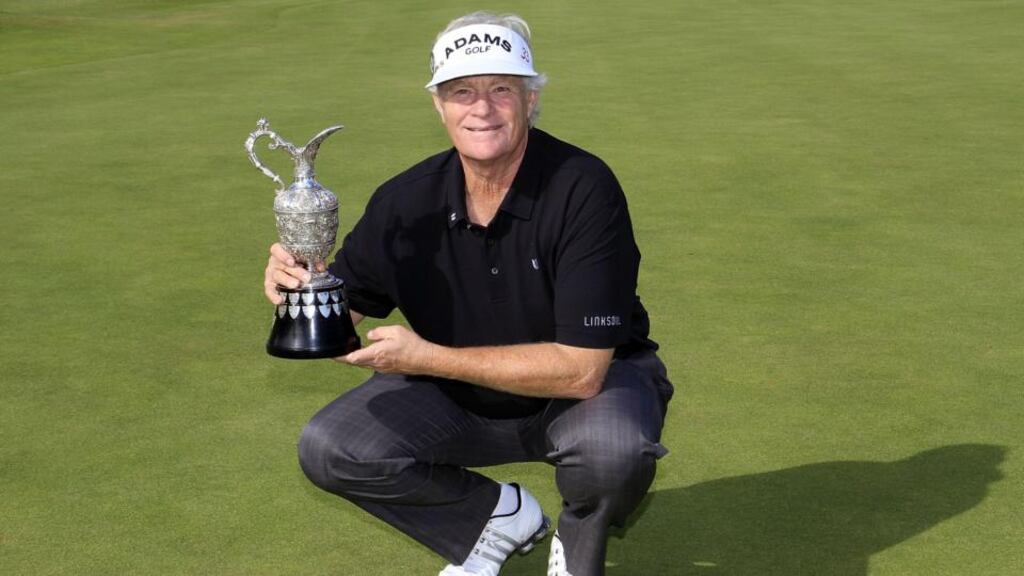 Mark Wiebe of the United States poses with the trophy after winning a play-off against Bernhard Langer of Germany to win the 2013 Senior Open Championship at Royal Birkdale in Southport. Phortograph: Phil Inglis/Getty Images.