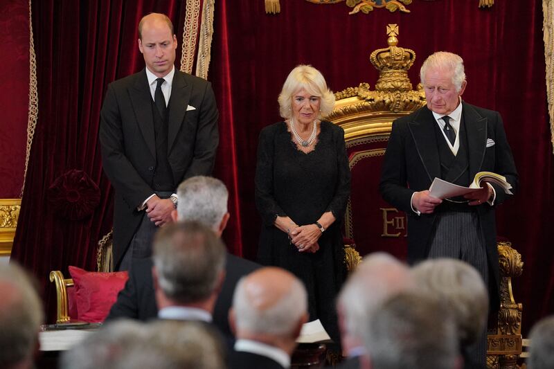 Britain's Prince William and Camilla, Queen Consort, listen as  King Charles III speaks. Photograph: Jonathan Brady via Getty Images