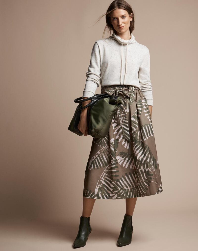 Palm and floral prints remain strong for the new season particularly on a dark background like this skirt. Skirt €47.50, jumper €34, boots €95 and bag €47.50 from M&S spring summer collection.