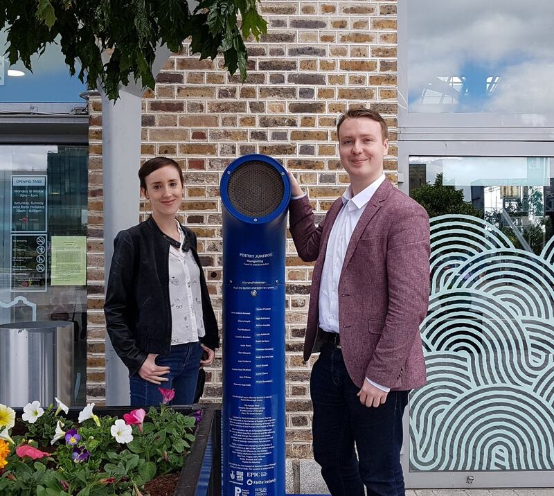 Jessica Traynor, deputy Epic Museum director and Nathan Mannion, senior curator, with the Poetry Jukebox