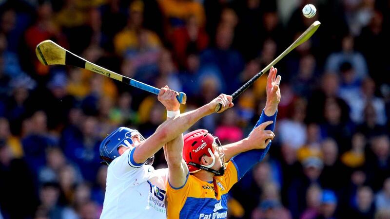John Conlon of Clare challenges for possession with Waterford’s Conor Prunty   during the Munster SHC round-robin game at Walsh Park. Photograph: Ryan Byrne/Inpho