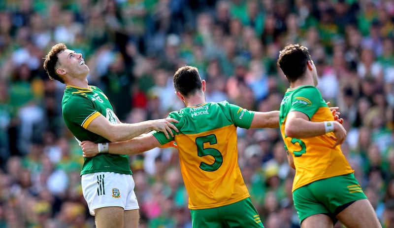 Meath’s Jordan Morris, left, reacts to a missed chance in the All-Ireland semi-final against Donegal on Sunday. Photograph: Ryan Byrne/INPHO