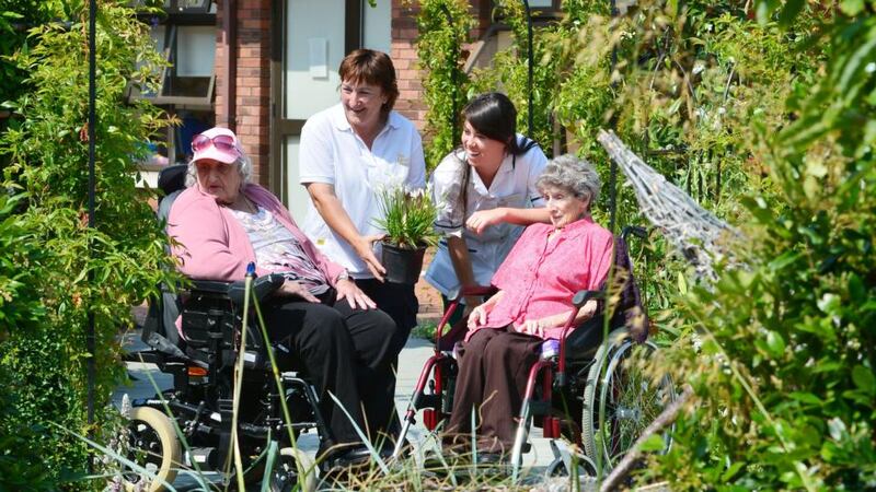 Eileen Nolan, head gardener, and Deirdre Moran, occupational therapist with patients Kathleen Owens and Sarah Doherty. Photograph: Alan Betson