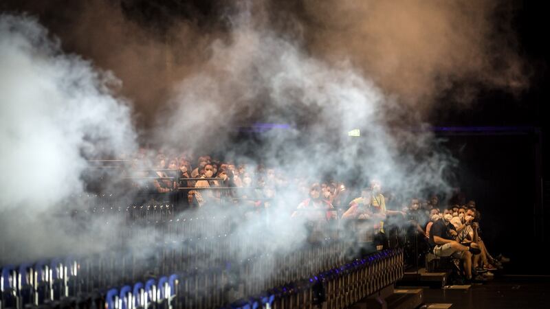 Smoke machines were used to study the spread of aerosols during the concert at the Quarterback Immobilien Arena in Leipzig, Germany. Photograph: Gordon Welters/The New York Times