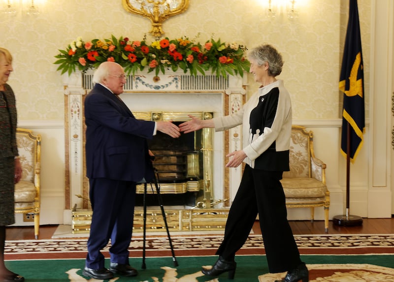 Michael D Higgins greets Catherine Connolly at the Áras. Photograph: Alan Betson