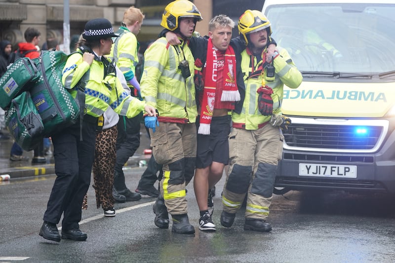 Liverpool parade ramming: Police and emergency personnel deal with the injured. Photograph: Owen Humphreys/PA
