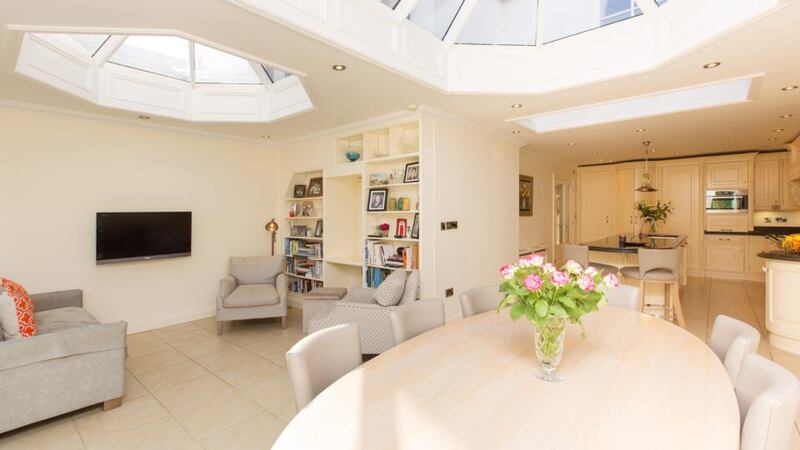 The large dining and living space to the rear of the kitchen at  66 Tritonville Road in Sandymount is remarkably bright thanks to two roof lanterns and walls of glass.