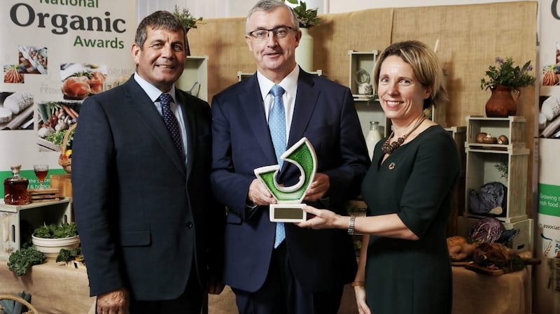 Wexford-based Irish Country Meats magazine director Joe Hyland (centre) receiving the Overall Award at this year’s Bord Bia National Organic Awards with Minister of State for the Department of Agriculture, Food and the Marine, Andrew Doyle and Tara McCarthy, ceo Bord Bia