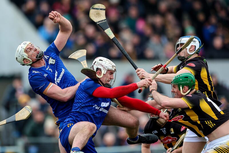 Colm Cleary and Adam Hogan of Clare in action against Kilkenny's Eoin Cody and TJ Reid during the league clash at Ennis. Photograph: Natasha Barton/Inpho 