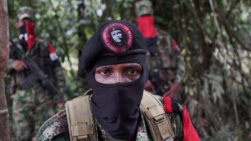 A commander of the National Liberation Army (ELN)  in the northwestern jungles of Colombia. Photograph: Federico Rios/Reuters