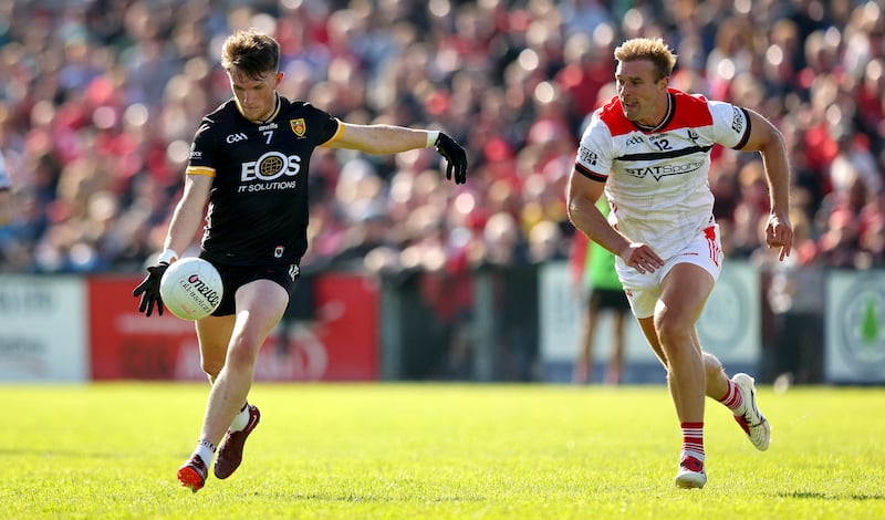 Down’s Miceal Rooney and Louth's Conor Grimes. Photograph: Ryan Byrne/Inpho
