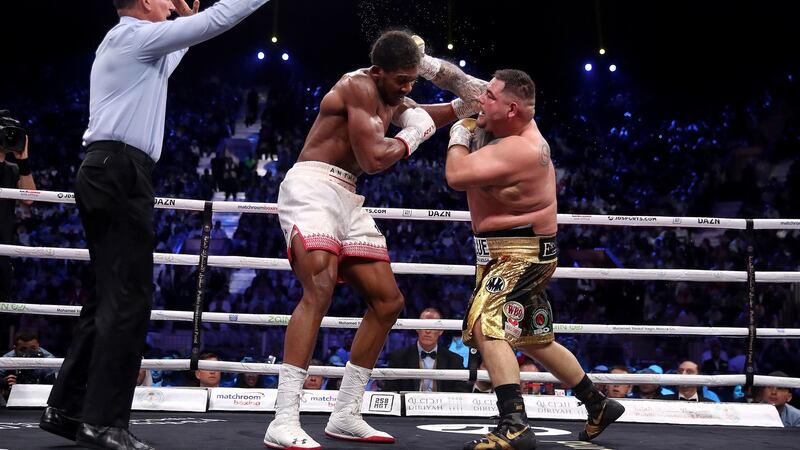 Andy Ruiz Jr tries to get inside   Anthony Joshua ’s guard  during the heavyweight title fight in Diriyah, Saudi Arabia. Photograph: Nick Potts/PA Wire