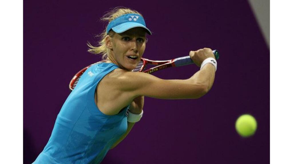 Elena Dementieva returns a shot to Samantha Stosur of Australia during day three of the WTA Championships in Doha, Qatar. The Russian announced her retirement from the game. (Photograph: Bryn Lennon/Getty Images)