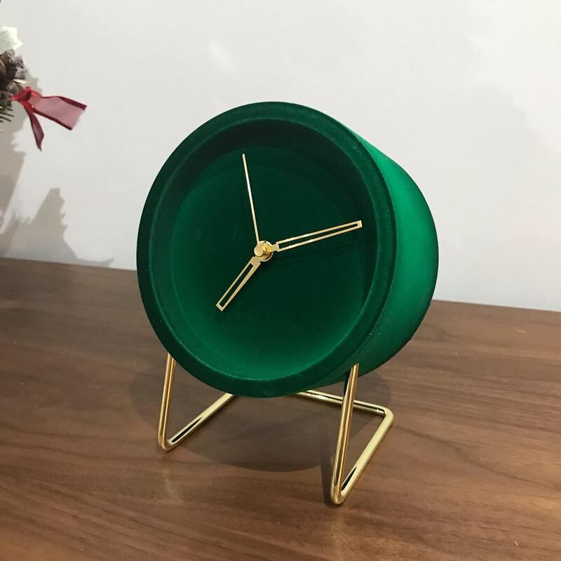 This flock clock from Pieces is perfect for your bedside table