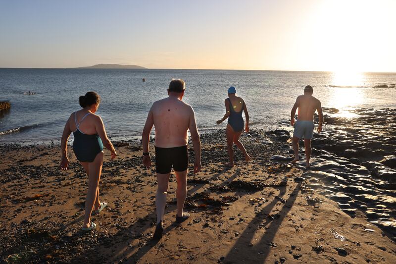 Anne Sullivan, Joe Keeling, Michele Owens and Dave Tuite at Low Rock Beach. Photograph: Dara Mac Dónaill











