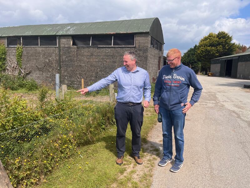 Enda Buckley of the Carbery Group and monitor farmer John Cullinane discuss the impact of new hedgerows installed at Shinagh research farm in Co Cork. Photograph: Kevin O'Sullivan