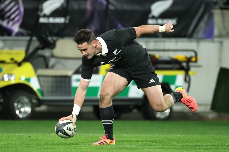 Will Jordan scores for the All Blacks against Italy. Photograph: Phil Walter/Getty Images