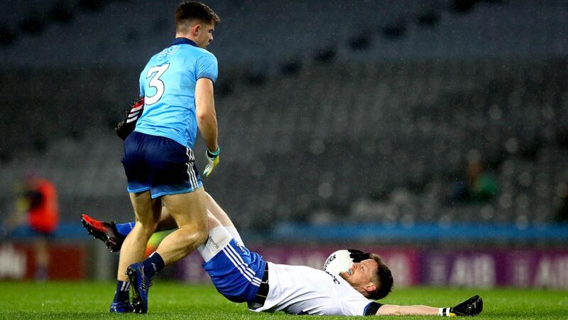 Dublin’s David Byrne tangles with Conor McManus of Monaghan at Croke Park. Photo: Ryan Byrne/Inpho