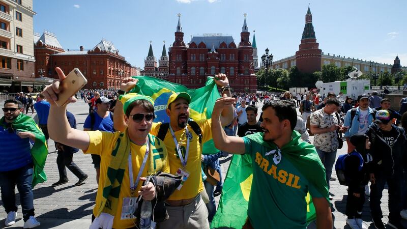 Brazil supporters gather near the Kremlin in central Moscow. Photograph: Gleb Garanich/Reuters
