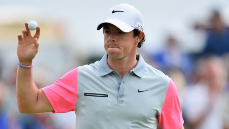 Rory McIlroy of Northern Ireland reacts to his birdie putt on the ninth green during the final round of The 143rd Open Championship at Royal Liverpool   in Hoylake.  Photograph:  Stuart Franklin/Getty Images